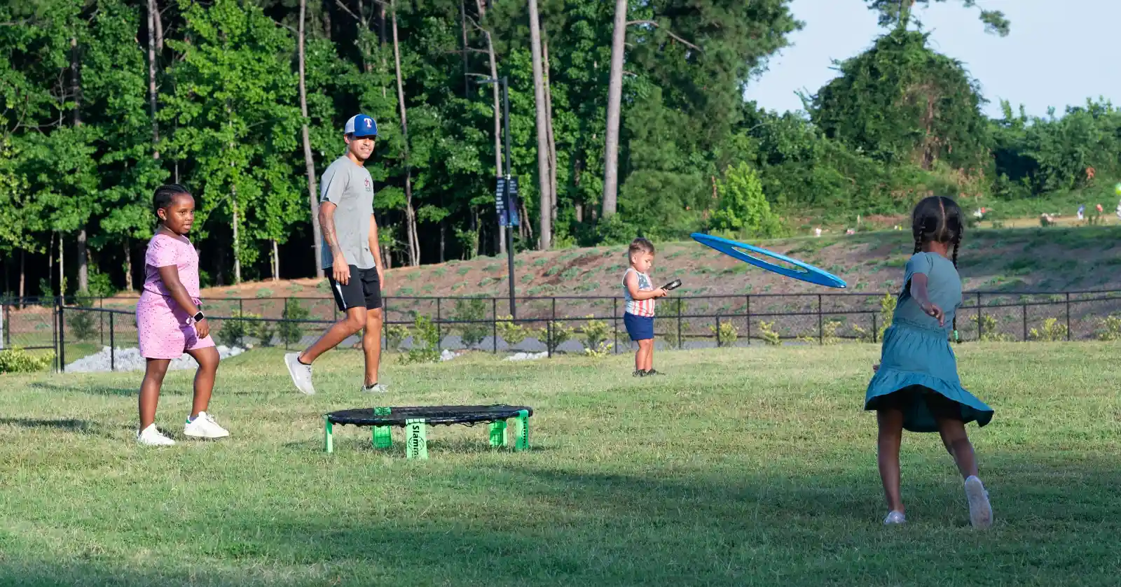 Families playing on the Victory Church lawn